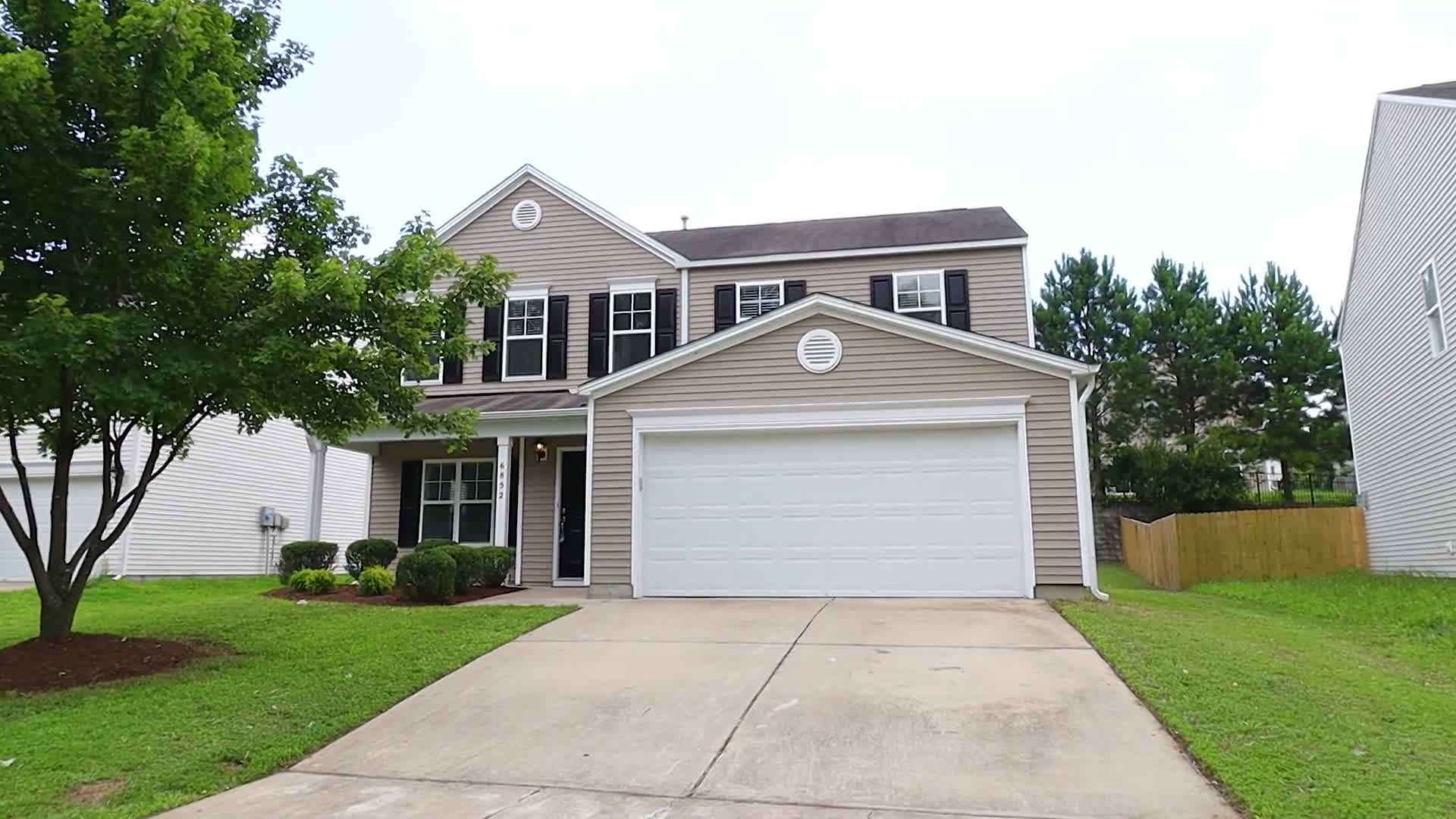 Two-storey suburban house with a two-car garage